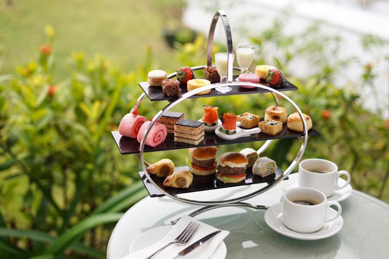 Grand Coloane Resort Macau Buitenkant foto Afternoon tea at the InterContinental Sanctuary Cove Resort, Queensland, Australia