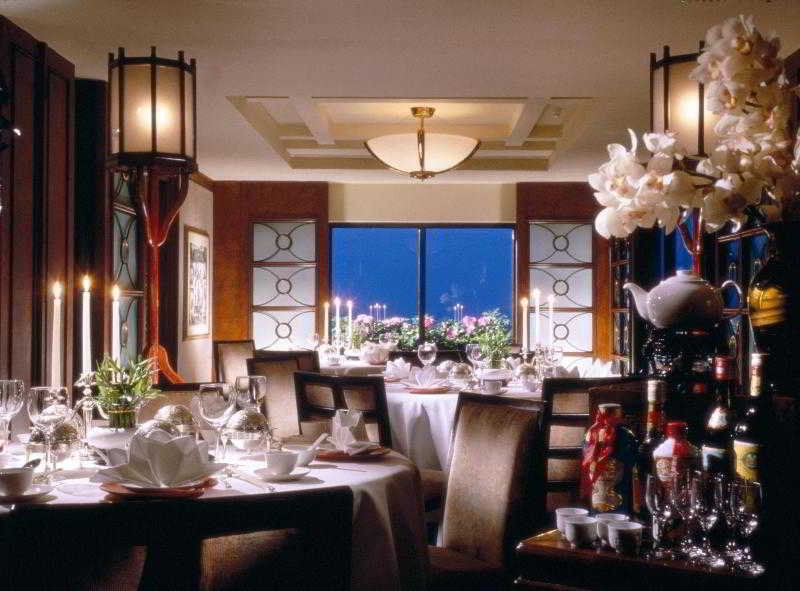 Grand Coloane Resort Macau Buitenkant foto The interior of the restaurant